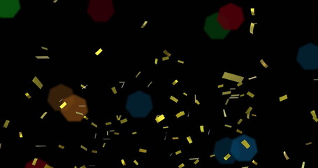 Drifting gold foil confetti strips floating in dark digital space, with colored hexagonal bokeh
