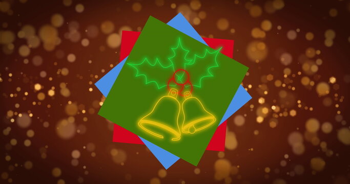 Displaying neon bells over colored squares in festive art, with holly leaves, berries and bokeh