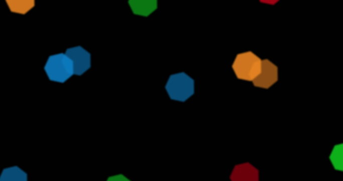 Cluster of colored bokeh octagons floating in black digital field, creating abstract light display