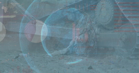 Showing holographic globe projecting data rings on rocky crash site, with gear fragments and cables