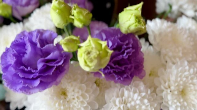 white-purple bouquet of flowers, white chrysanthemums, purple eustoma 