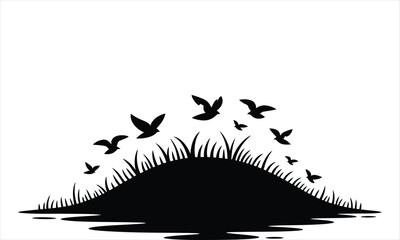 Silhouette of birds flying over grassy hill