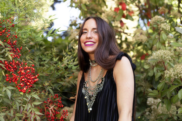Confident pose in the park: black outfit and coordinated accessories