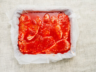 Fine pork chops in rich red juicy marinade. Raw meat product for cooking in many different way....