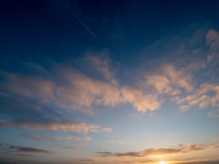 Colorful blue cloudy sun rise sky. Nature background. Calm and peaceful mood. Beautiful scene with...