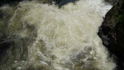 Swirling Whitewater Below Hydroelectric Spillway – Abstract Nature Texture