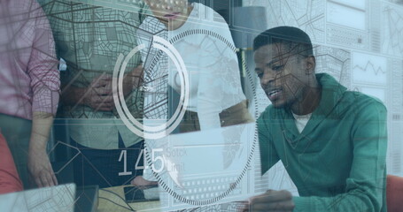 Focusing five colleagues examining holographic display on laptop in modern office, showing maps