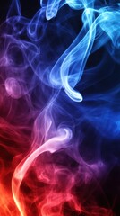 Fototapeta premium An abstract image showing swirling smoke with blue red and purple color gradients on a dark background