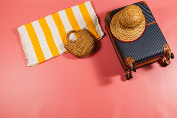 Stylish beach essentials including a suitcase and accessories