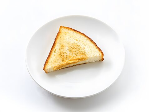 Minimalist breakfast featuring a single diagonal slice of peanut butter toast on a plain background.