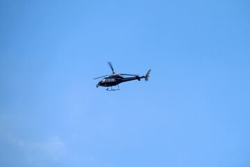 Some helicopter in the sky is filming the surrounding area.Nowadays, FPV drones already perform a...