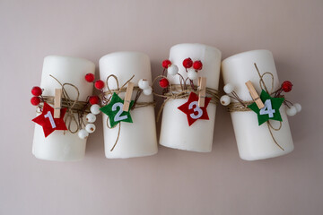 Handmade Christmas countdown advent four-week calendar. Festive holiday preparation craft master...