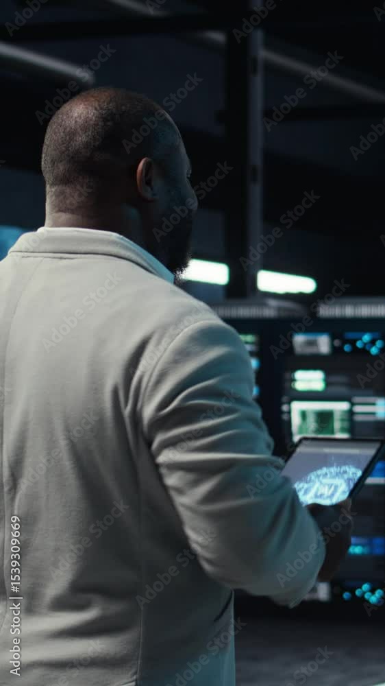 Poster vertical video software developer in data center using tablet, employing ai machine learning models.
