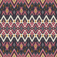 ikat pattern geometric diamond shapes and abstract floral motifs for background