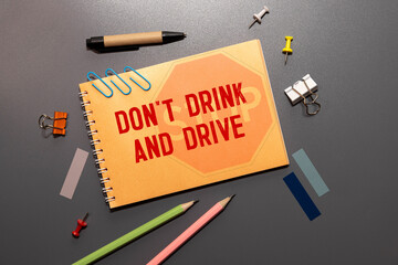 Don't Drink And Drive typography text on wooden blackboard