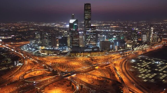 Riyadh City towers, King Abdullah Financial District ( KAFD ) buildings, King Abdulaziz Square, shot at blue sky showing the cityscape aerial with drone, Saudi Arabia