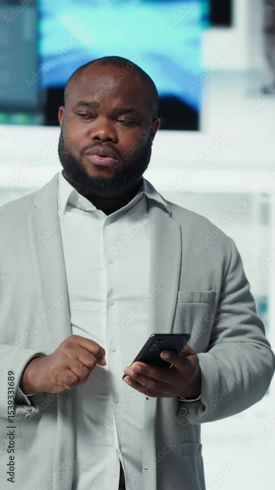 Poster vertical video happy person uses phone, interacting with social media posts on feed. joyous man brow