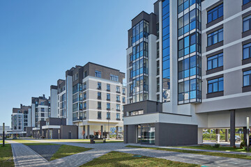 New modern block of flats in green area. residential apartment with flat buildings exterior. luxury...
