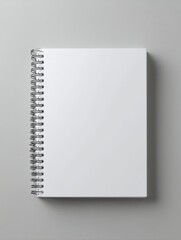 Clean Mockup of a Spiral Bound Planner with Blank Pages on a Minimalistic Gray Background