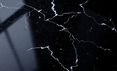 A smooth black onyx marble its surface reflecting a thousand facets boasting a high resolution that captures the intricate details and deep veins of this natural wonder