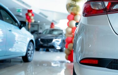 Car parked in luxury showroom. Car dealership office. Car showroom business. New car parked in modern showroom. Auto for sale and rent business. Automobile leasing and insurance. Electric automobile.
