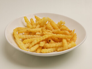 French fries on white plate, isolated 