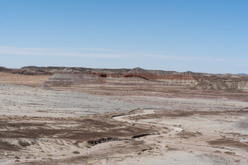 Eroded Desert Landscape at Petrified Forest National Park Under Clear Blue Sky