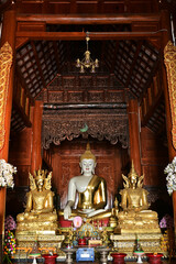 The statue of Phra Chao Tan Jai Buddha is enshrined in a teakwood chapel at Wat Den Sali Si Mueang Kaen temple or Wat Ban Den. Located at Cheng Mai Province in Thailand.