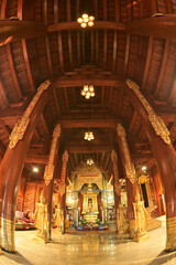 The statue of Phra Chao Pantan Buddha is enshrined in a teakwood chapel at Wat Den Sali Si Mueang Kaen temple or Wat Ban Den. Located at Cheng Mai Province in Thailand.