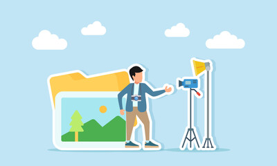 Photographer standing in front of gallery album folder near standing lamp and camera illustration of setting up location for photo or video shoot