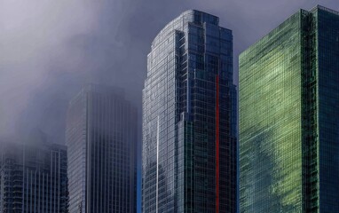 Fototapeta premium Modern city skyscrapers in mist