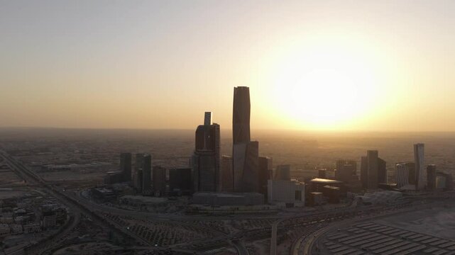 Drone aerial view of King Abdullah Financial District ( KAFD ) in Riyadh showing the cityscape before sunset, Saudi Arabia