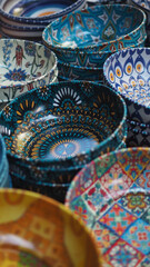 Colorful ceramic bowls displayed at a market