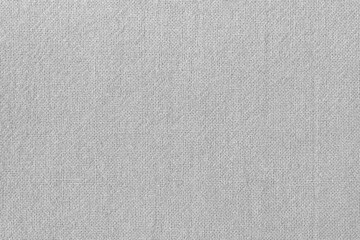 Light grey fabric cloth texture background, seamless pattern of natural textile.
