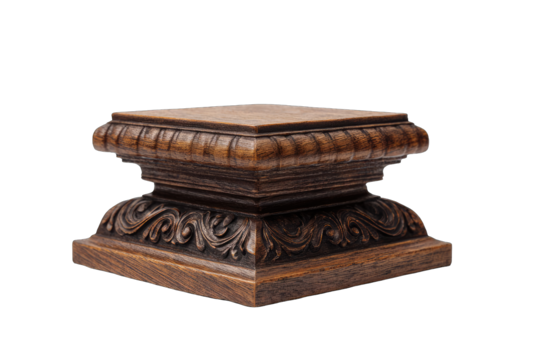 Ornate, dark-wood pedestal with a square top and base, featuring intricate carvings of swirling floral patterns and grooved detailing around the midsection.  The rich wood grain is visible