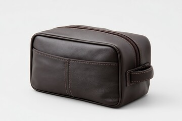 Brown leather toiletries bag rectangular with zipper on a neutral background