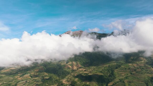 Aerial drone of agriculture and farmland in a mountainous area near the Canlaon volcano. Negros, Philippines