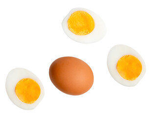 Top view set of raw brown chicken egg and cooked or boiled chicken eggs with egg yolk in three halves isolated with clipping path in png file format