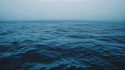 Fototapeta premium Blue sky over calm sea. Blue sea and sunny sky on horizon over calm water