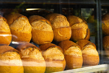 Fresh backed Turkish bread behind the glass on display