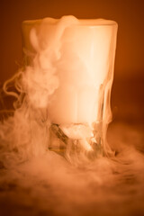 smoke and vapour from a glass