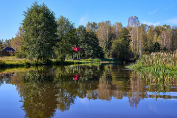 Tranquil Waterfront Gazebo on Sunny Day