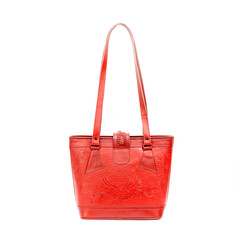 Beautiful red leather shoulder bag with embossed decoration for women isolated on white background,...