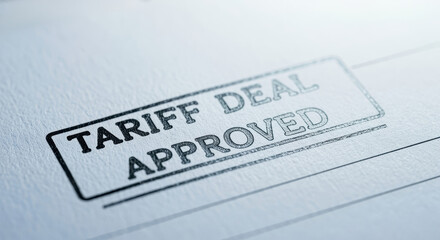 Tariff deal approved stamp on document, symbolizing agreement and authorization in trade or business context
