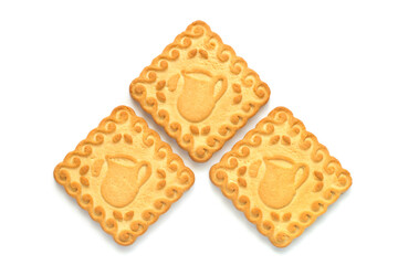Three square milk biscuits on a white background. Three natural cookies with a shadow.