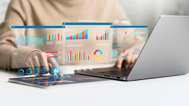 An analyst uses Data analytics automated with AI technology. Dashboard report, operations charts, KPI insights. and SEO. Big Data technology, Business analysis and artificial intelligence automation.
