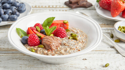 Chia buckwheat pudding with fresh berries and mint