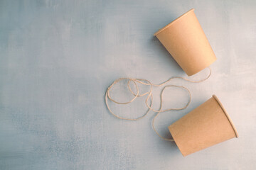 Paper Cups Phone on Light Blue Background