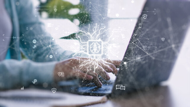 Hands typing on laptop with AI digital interface overlay, symbolizing artificial intelligence integration, big data analytics, and smart technology in daily work and personal life.