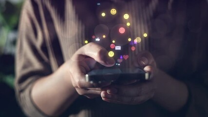 Close-up of hands holding smartphone with floating social media icons, symbolizing digital interaction, real-time communication, and online user engagement for modern technology and lifestyle themes. - Powered by Adobe